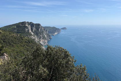 View of the rugged cliffs and blue sea near Portovenere on the Ligurian coast.