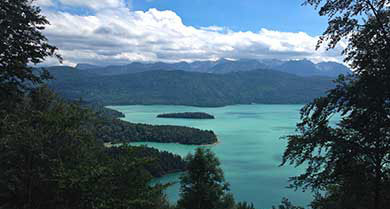 Green shimmering lake in the Bavarian Alpine foothills