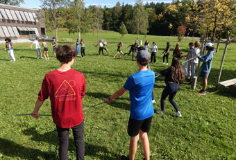 Young students on a meadow