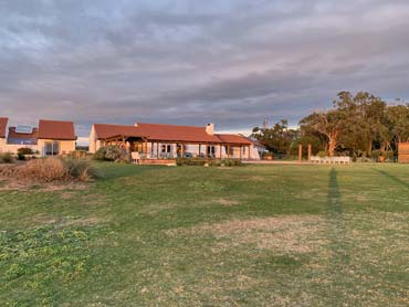 Exterior view of Monte Bem Posto, a serene accommodation nestled near Porto Covo. Surrounded by nature, it offers a tranquil retreat with modern amenities and stunning views of the coastal beauty