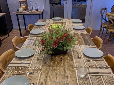 Breakfast table set in rustic accommodation along the Fishermens Trail in Portugal